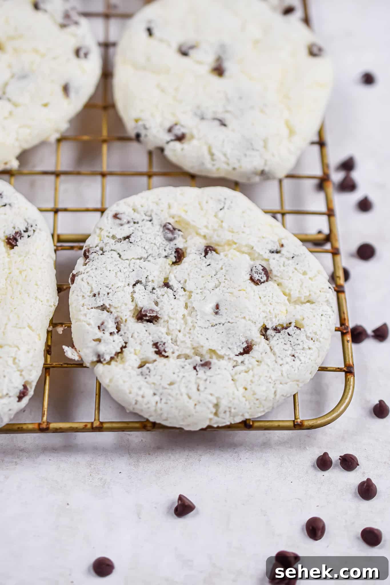 Chocolate Chip Angel Food Cake Cookies: Light, Fluffy Treats 4 A close up of the angel food cake mix cookies on a wire rack.