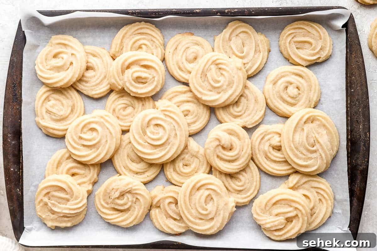 Classic Homemade Butter Cookies Recipe for Crisp, Melt-in-Your-Mouth Cookies 10 A baking tray full of homemade butter cookies.