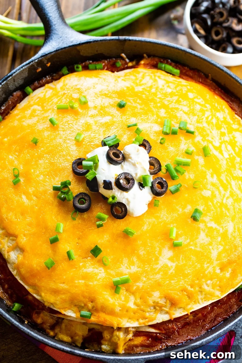 One-Pan Chicken Tortilla Pie Recipe for Quick Weeknight Dinners 3 Chicken Tortilla Pie in a cast iron pan.