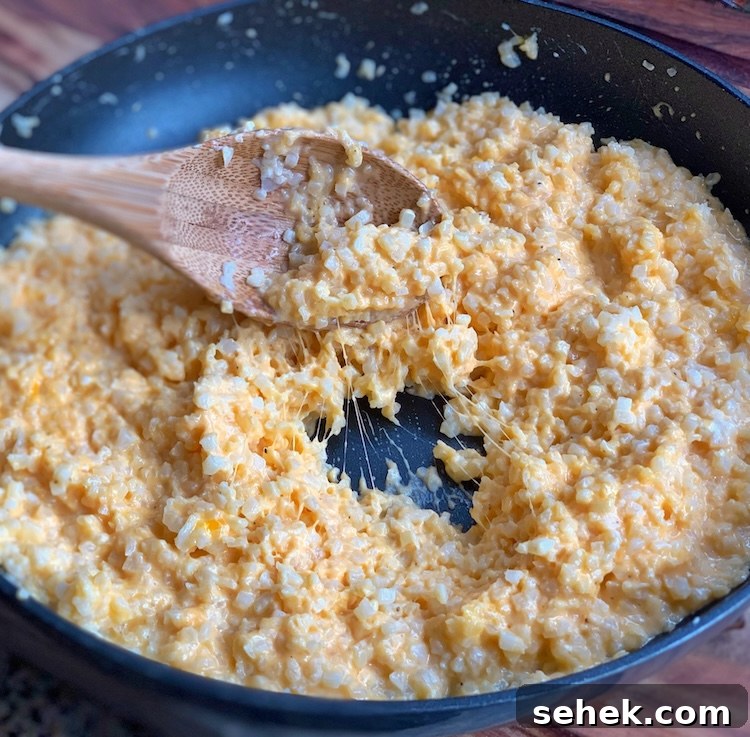 Delicious kid friendly cheesy cauliflower vegetable side dish recipe for dinner.
