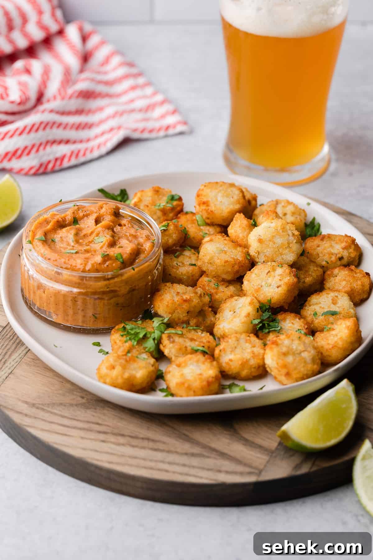 Creamy Cajun Sauce Recipe for Pasta, Seafood & Chicken 3 cajun sauce plated with tater tots