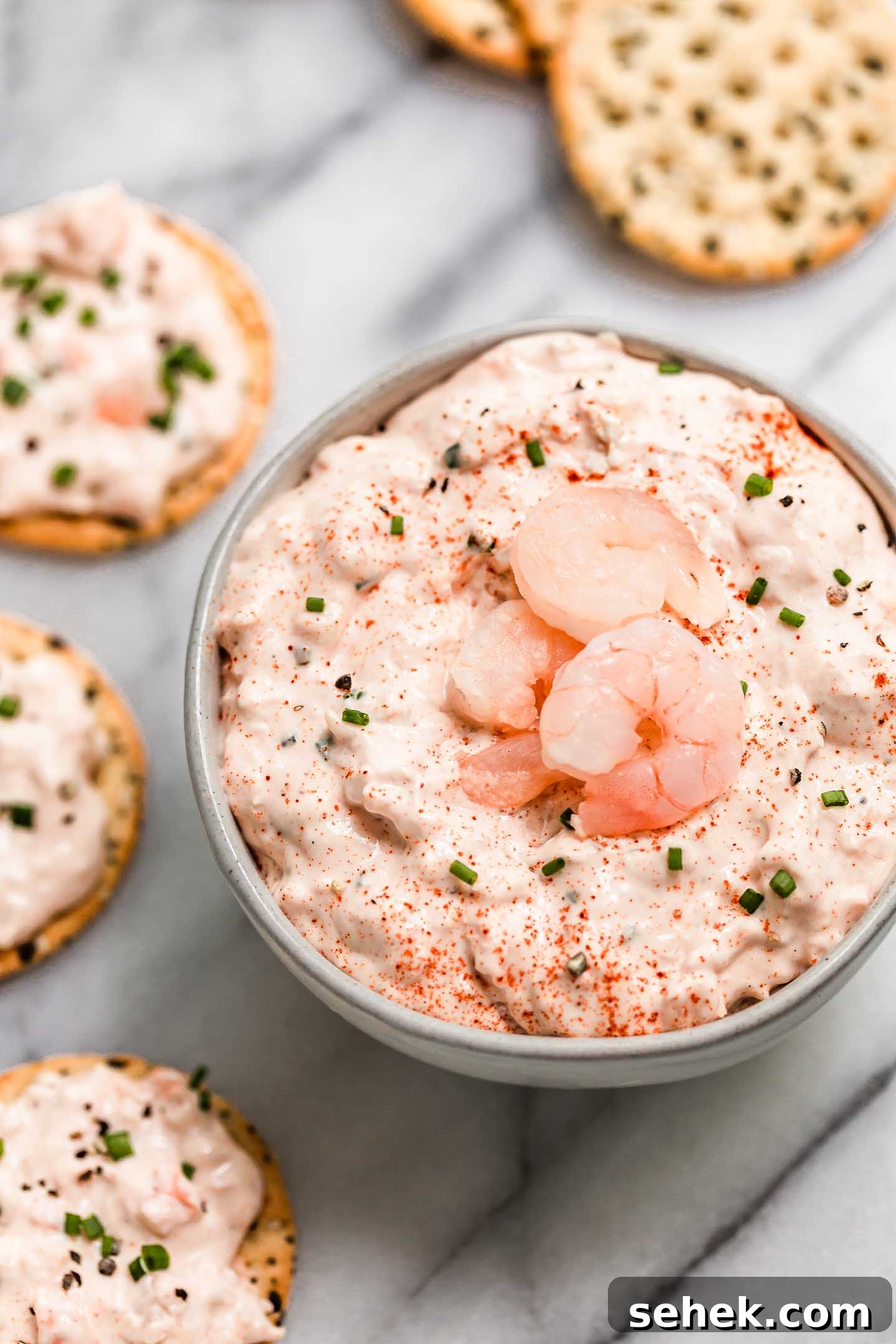 Creamy Pink Shrimp Dip Recipe for Parties and Appetizers 5 pink shrimp dip served with crackers