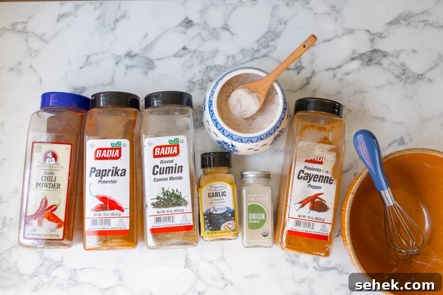 Homemade Taco Seasoning Mix Recipe with Quick Video Guide 3 all taco seasoning ingredients (chili powder, paprika, ground cumin, onion powder, garlic powder, salt, and cayenne pepper)