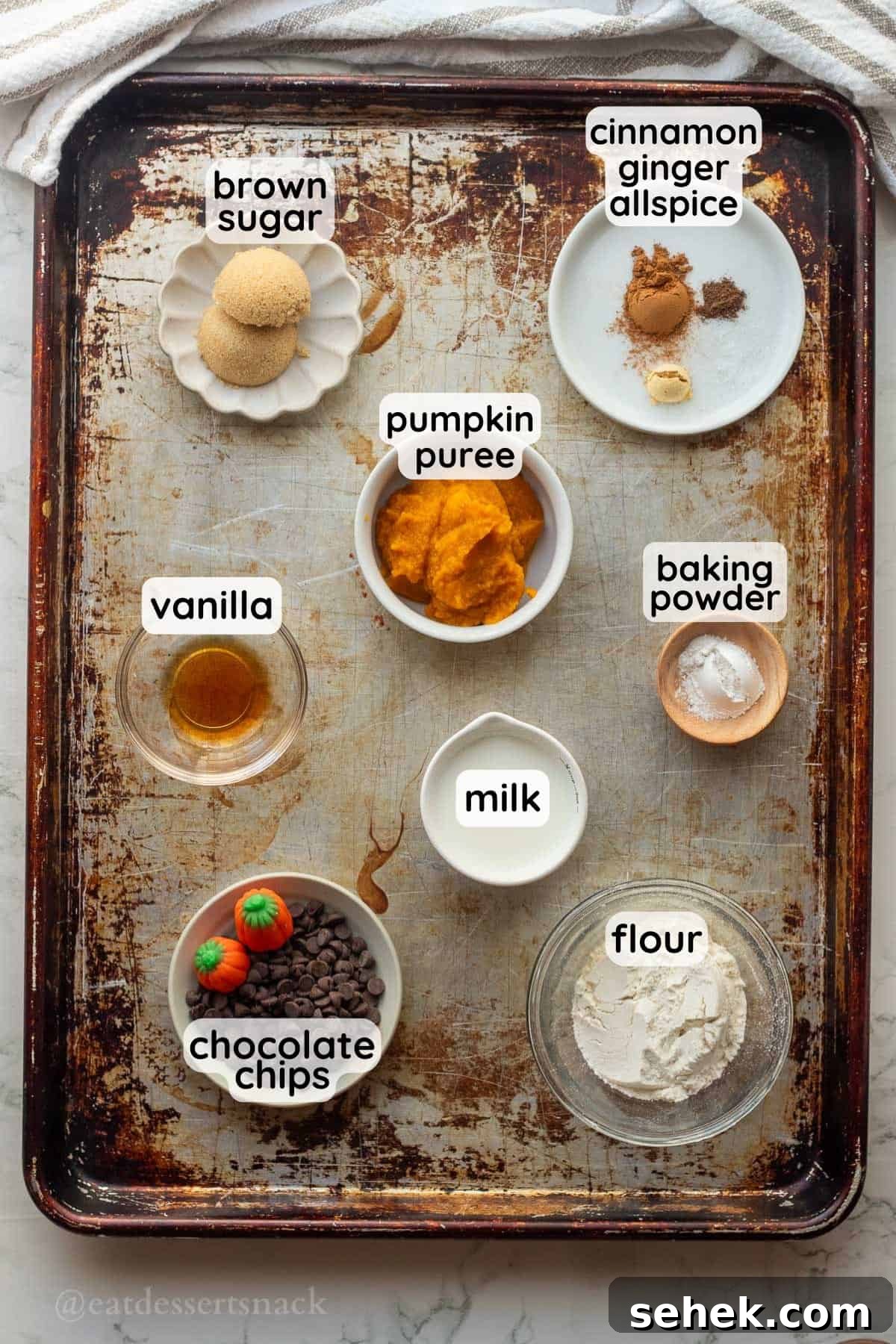 Quick Pumpkin Spice Mug Cake Recipe for One 3 Ingredients for pumpkin mug cake labeled in glass bowls.