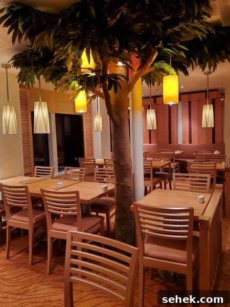 indoor seating with lanterns and fake trees