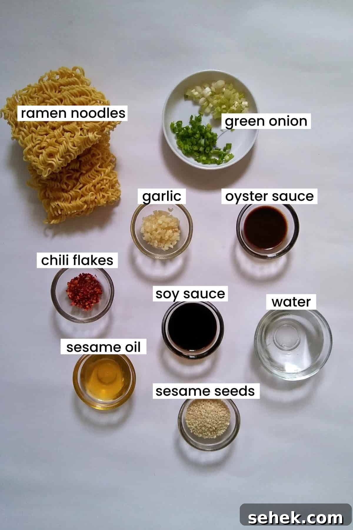 10-Minute Sesame Garlic Ramen Recipe for Fast Flavor 3 Image showing ingredients placed on a white background.
