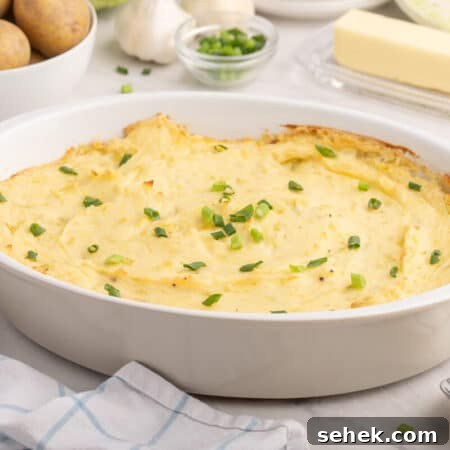 The recipe in a white serving dish.