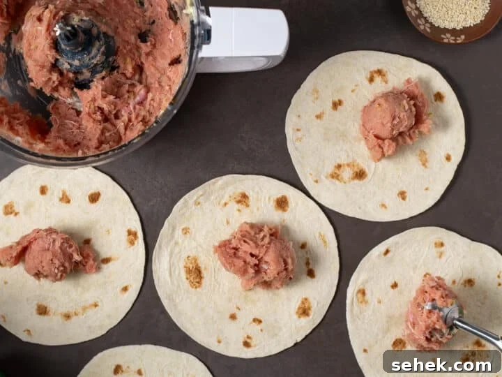 scoops of ahi tuna mixture on tortillas