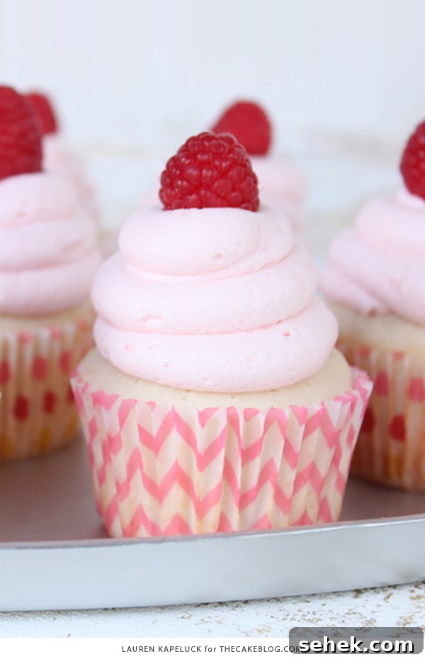 Champagne and Raspberry Cupcakes Recipe for Celebrations 9 Champagne & Raspberry Cupcakes | by Lauren Kapeluck for TheCakeBlog.com
