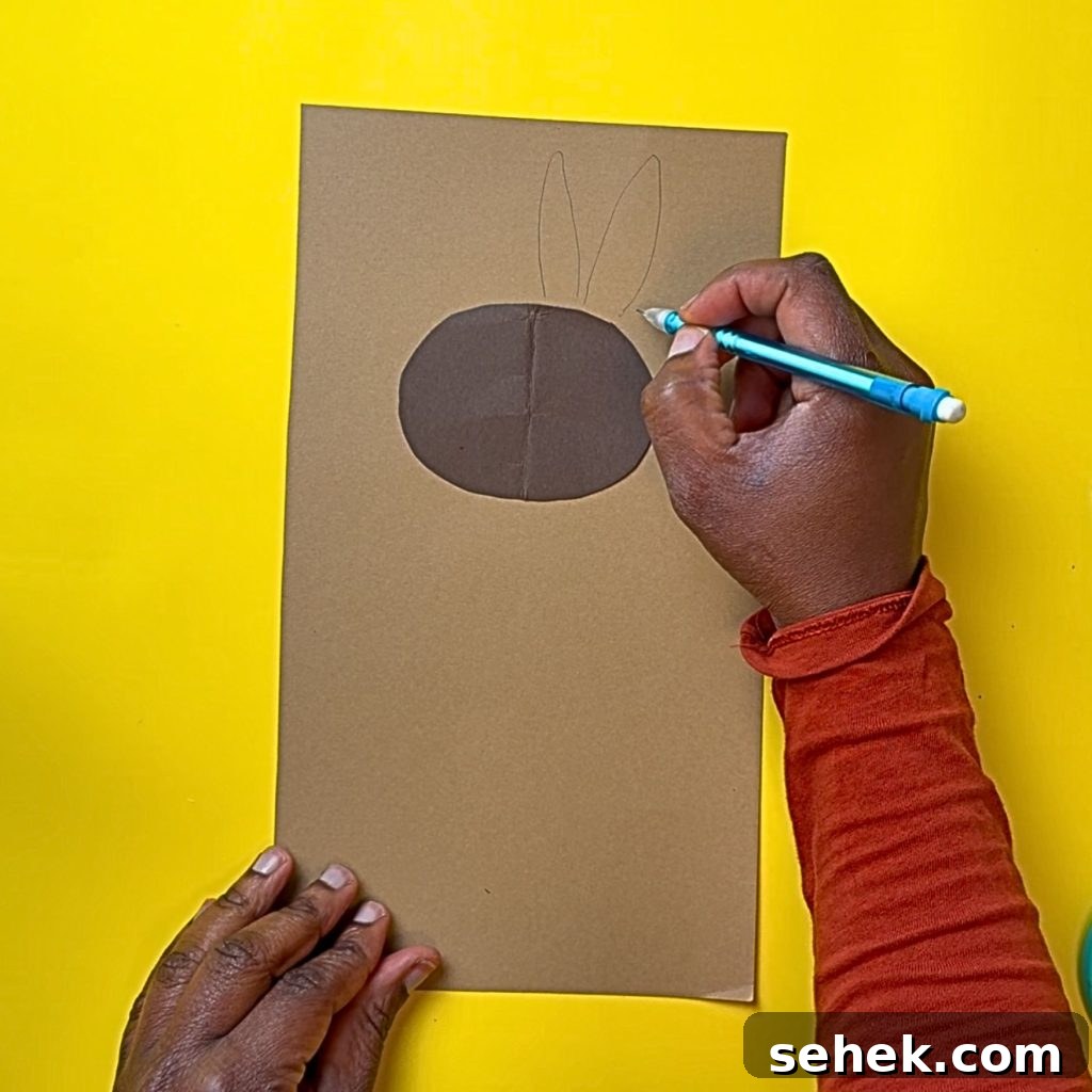 DIY Paper Sunflower with Pom-Pom Center: Step-by-Step Craft Tutorial 5 Pencil outline of petals
