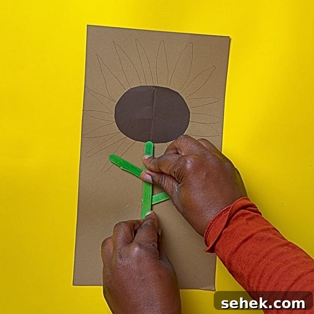 DIY Paper Sunflower with Pom-Pom Center: Step-by-Step Craft Tutorial 7 Stem attached