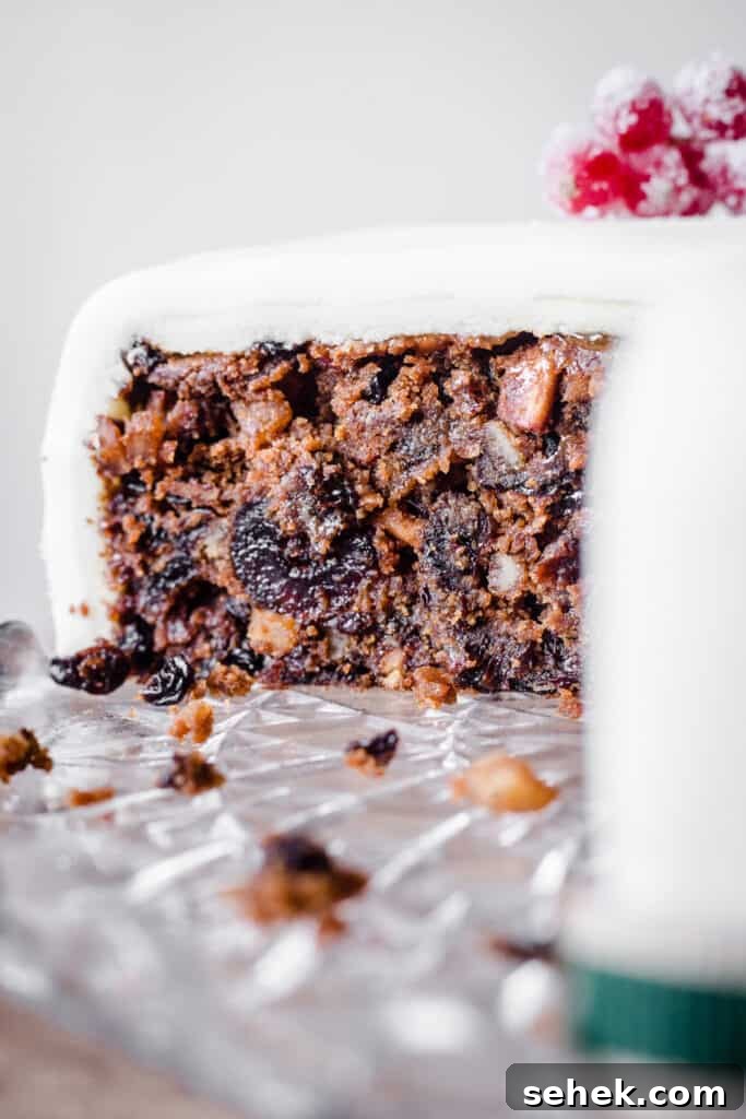 Traditional Gluten-Free Christmas Fruitcake: Rich Dark Recipe 8 Side view of Christmas Cake with slice taken out