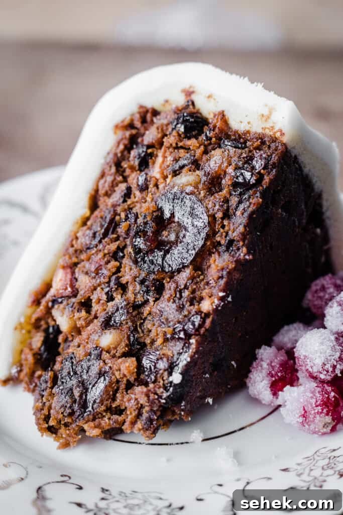 Traditional Gluten-Free Christmas Fruitcake: Rich Dark Recipe 9 Close up of cut slice of Christmas Cake on a plate