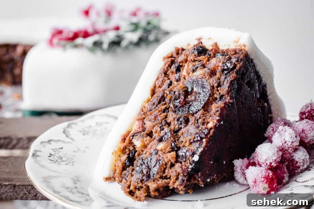 Traditional Gluten-Free Christmas Fruitcake: Rich Dark Recipe 6 Close up of cut slice of Christmas Cake on a plate