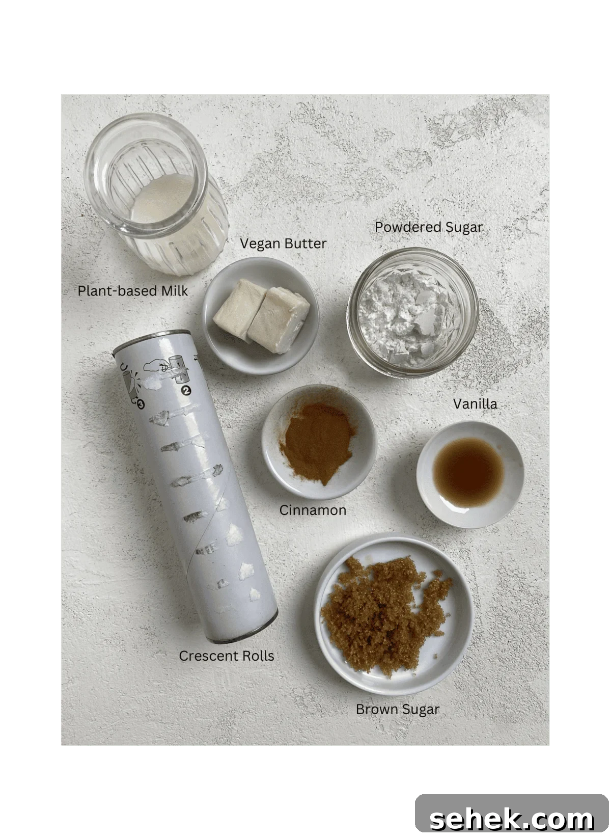 Quick Crescent Roll Cinnamon Buns: 20-Minute Sticky Rolls 3 ingredients for Cinnamon Rolls measured out against a white surface