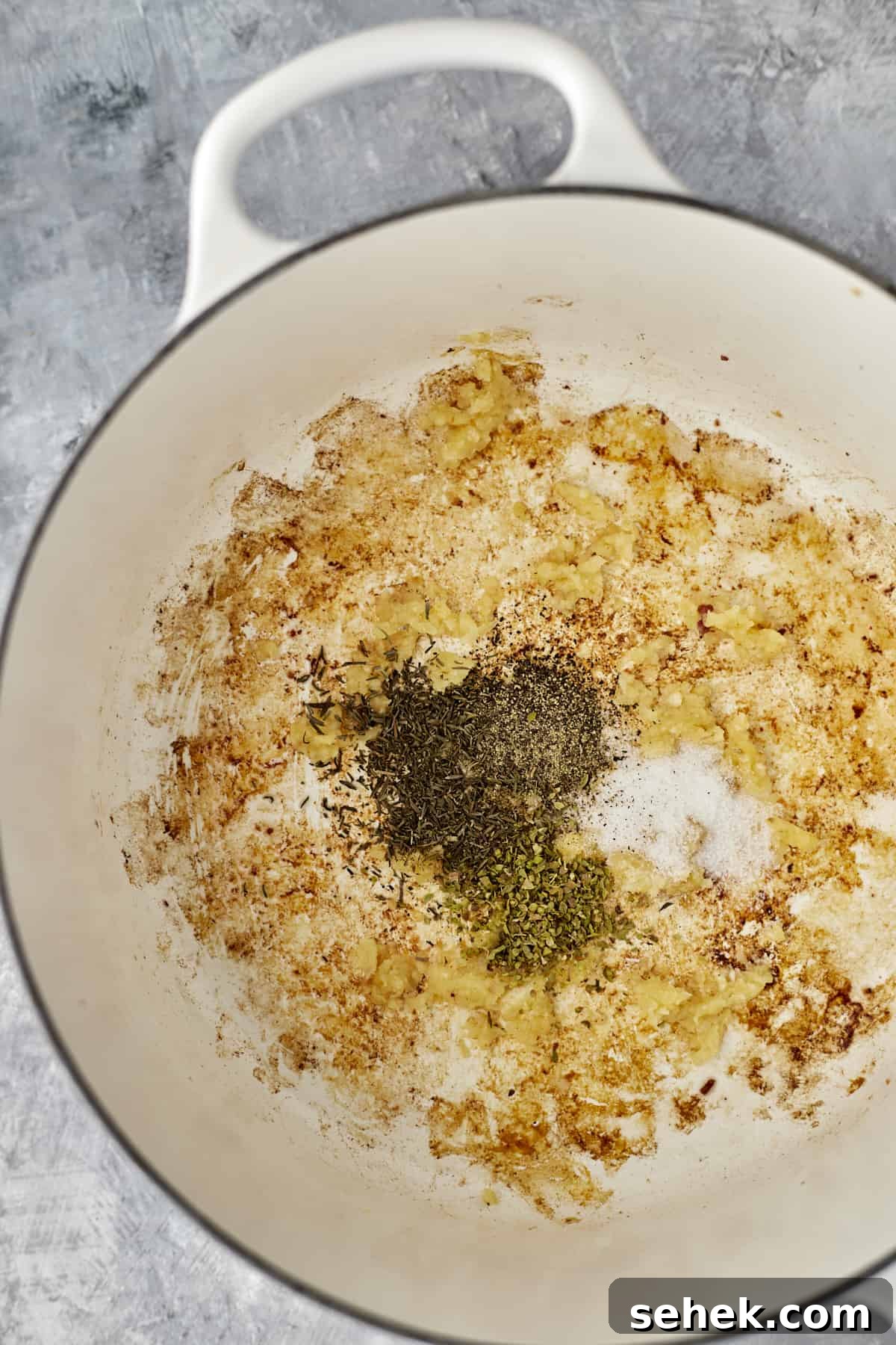 One-Pot Spaghetti Carbonara: Quick Creamy Classic Recipe 4 onions sautéing in the bottom of a white pot
