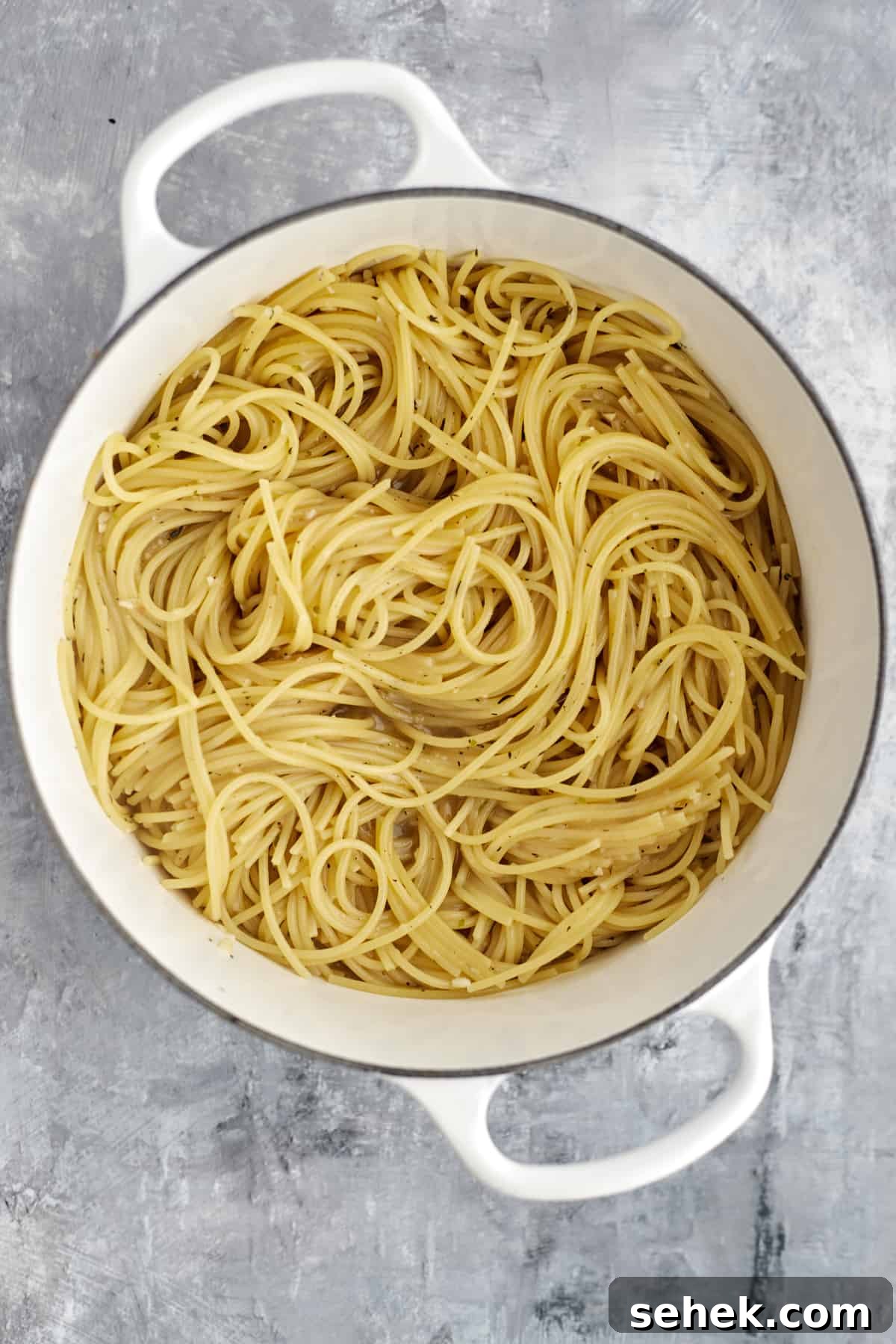 One-Pot Spaghetti Carbonara: Quick Creamy Classic Recipe 7 overhead image of cooked spaghetti noodles