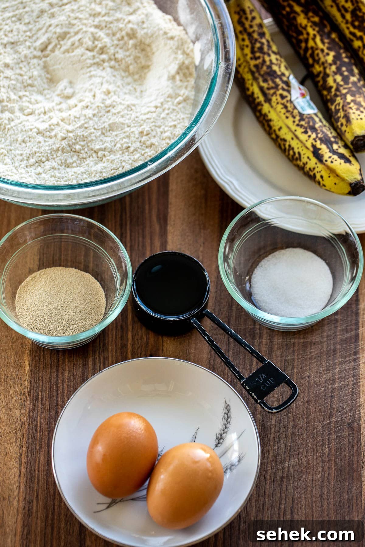 Banana Bread Rolls Recipe: Soft, Cinnamon-Swirled Breakfast Buns 3 Ingredients for bread rolls made with banana on a chopping board