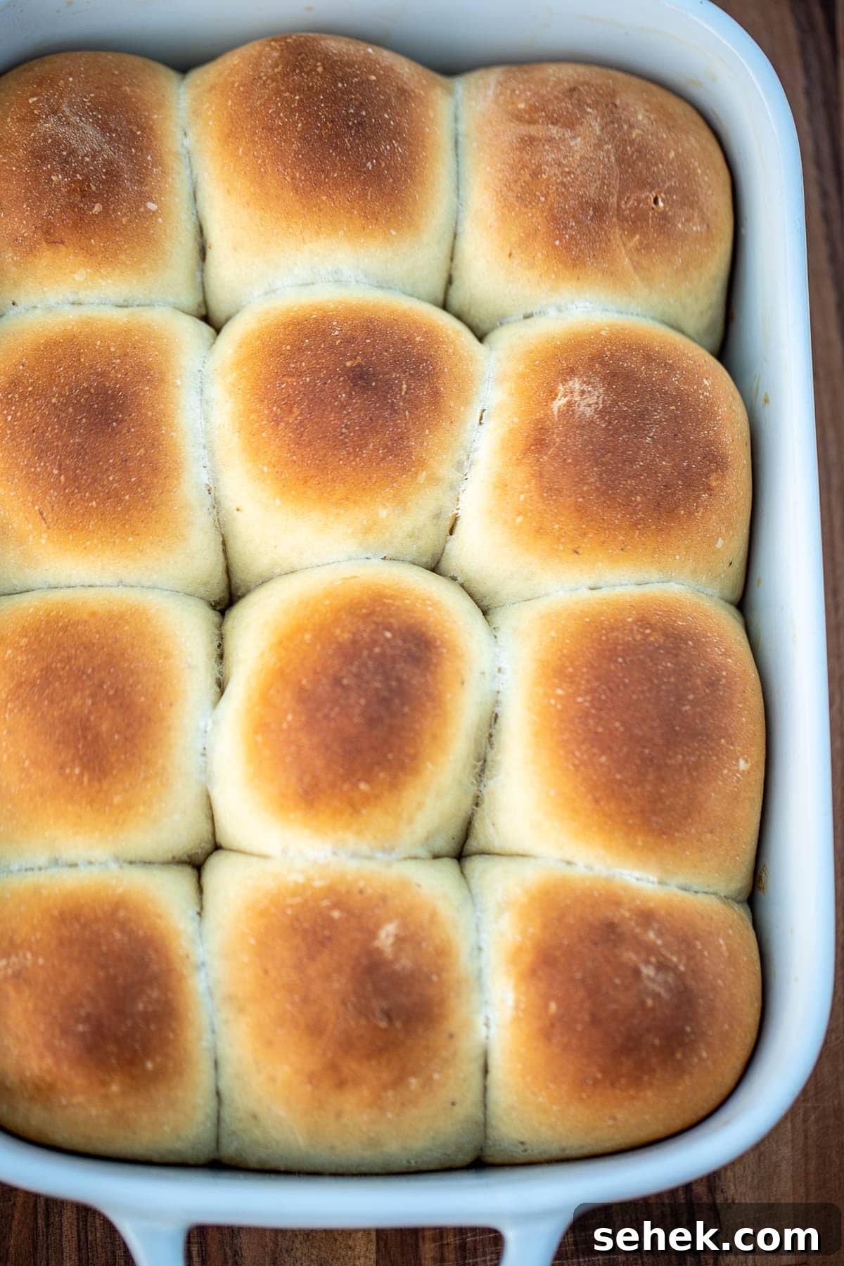 Banana Bread Rolls Recipe: Soft, Cinnamon-Swirled Breakfast Buns 7 Fully baked bread rolls in pan