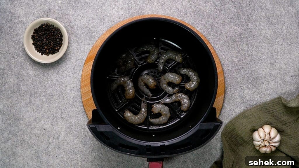 Garlic Butter Shrimp in the Air Fryer: Quick Crispy Recipe 8 Shrimp in Air fryer basket