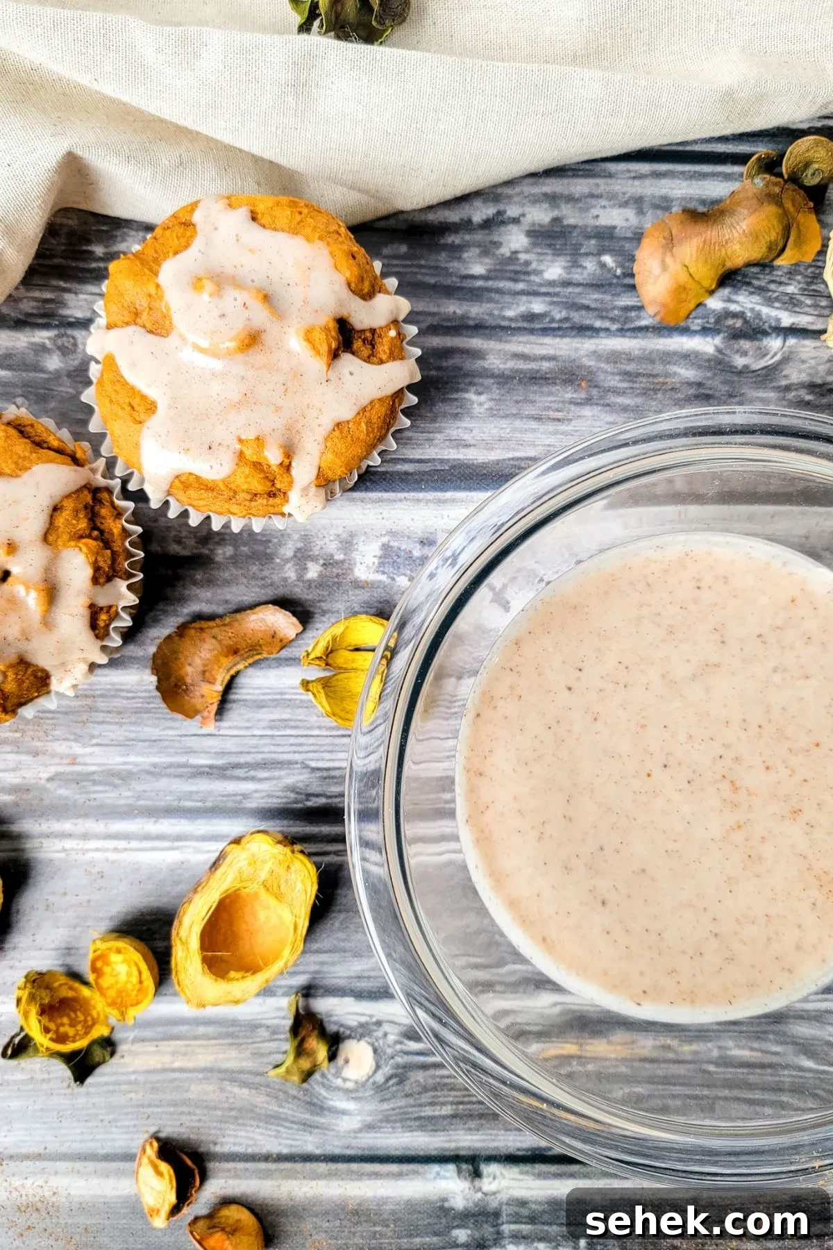 Cinnamon Spice Glaze Recipe for Cakes, Donuts & Pastries 7 Bowl of dairy free sugar cinnamon glaze and muffins with glaze on top.