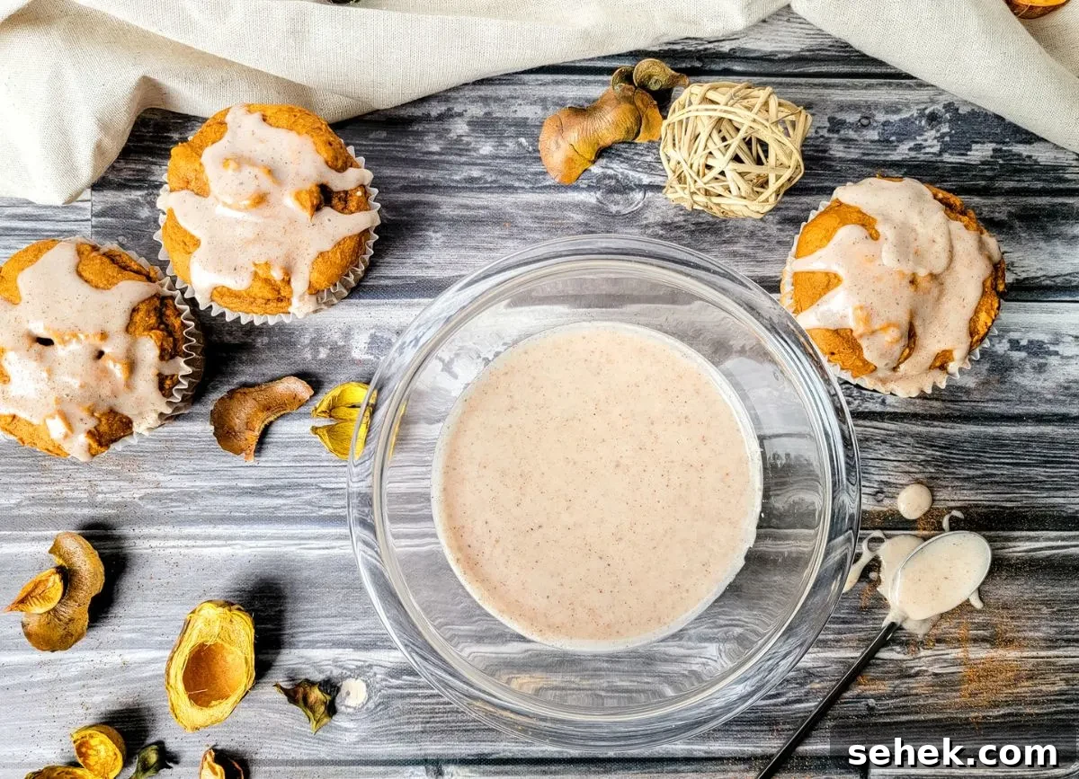 Cinnamon Spice Glaze Recipe for Cakes, Donuts & Pastries 9 Bowl of glaze with glazed muffins.