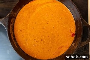 Stirring in the sour cream mixture