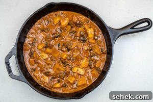 Stirring in the potatoes & mushrooms