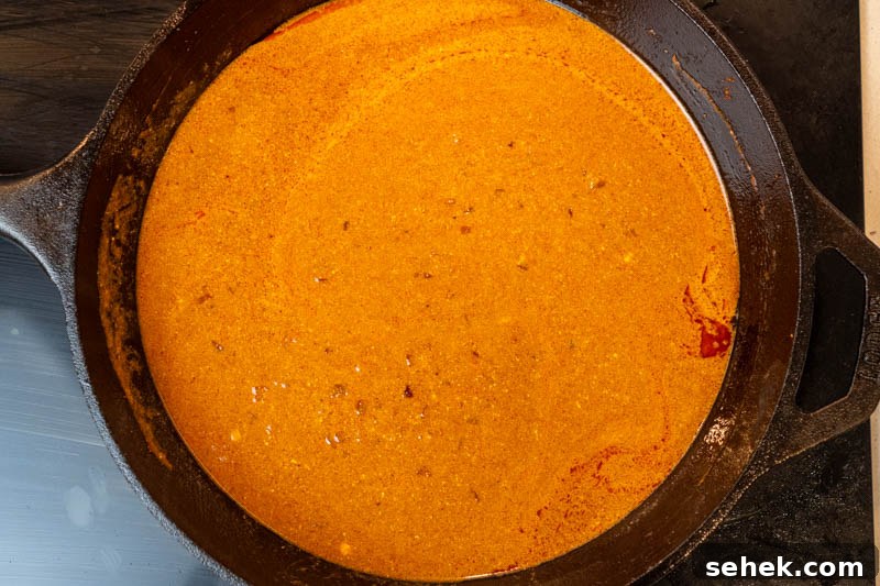 Stirring in the sour cream mixture