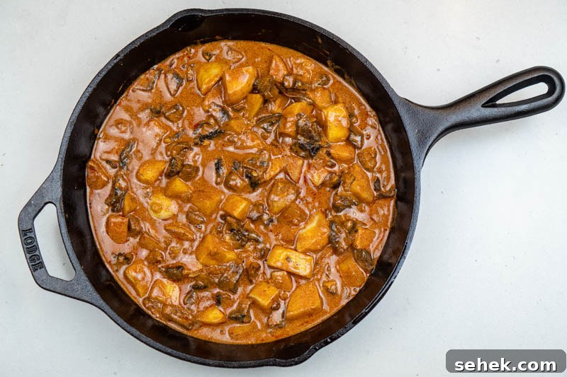 Stirring in the potatoes & mushrooms