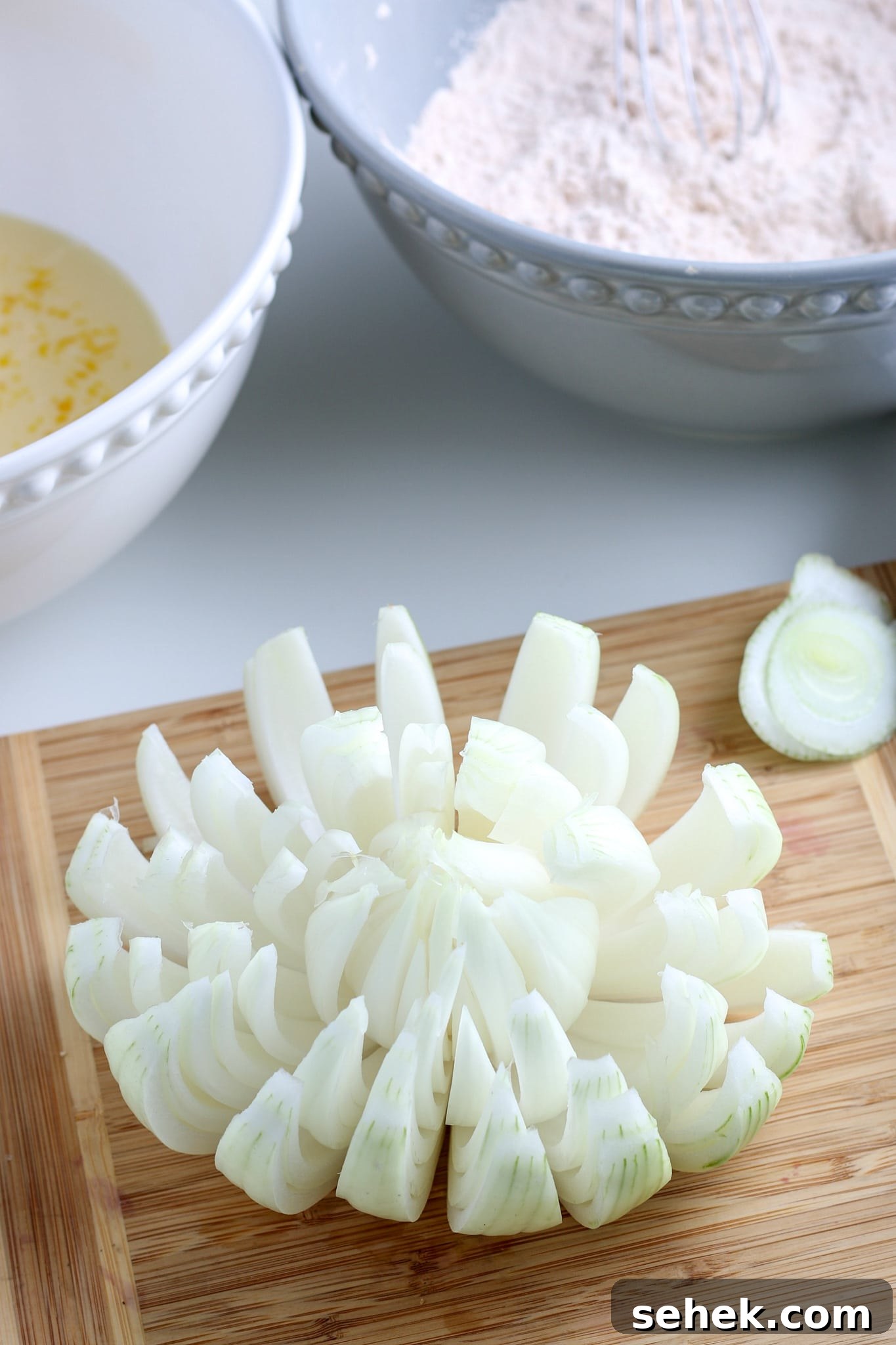 Crispy Air Fryer Blooming Onion Recipe for Perfect Appetizers 7 the onion cut into a bloom.