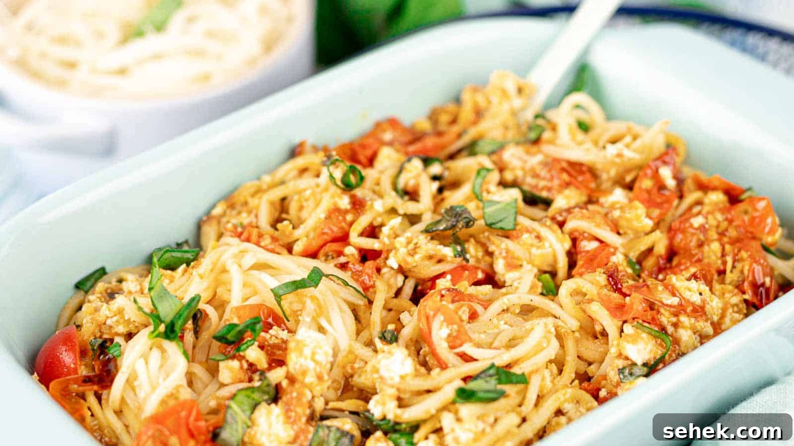17 Cozy Casseroles for Any Night of the Week 4 Baked palmini with feta in a light blue casserole.
