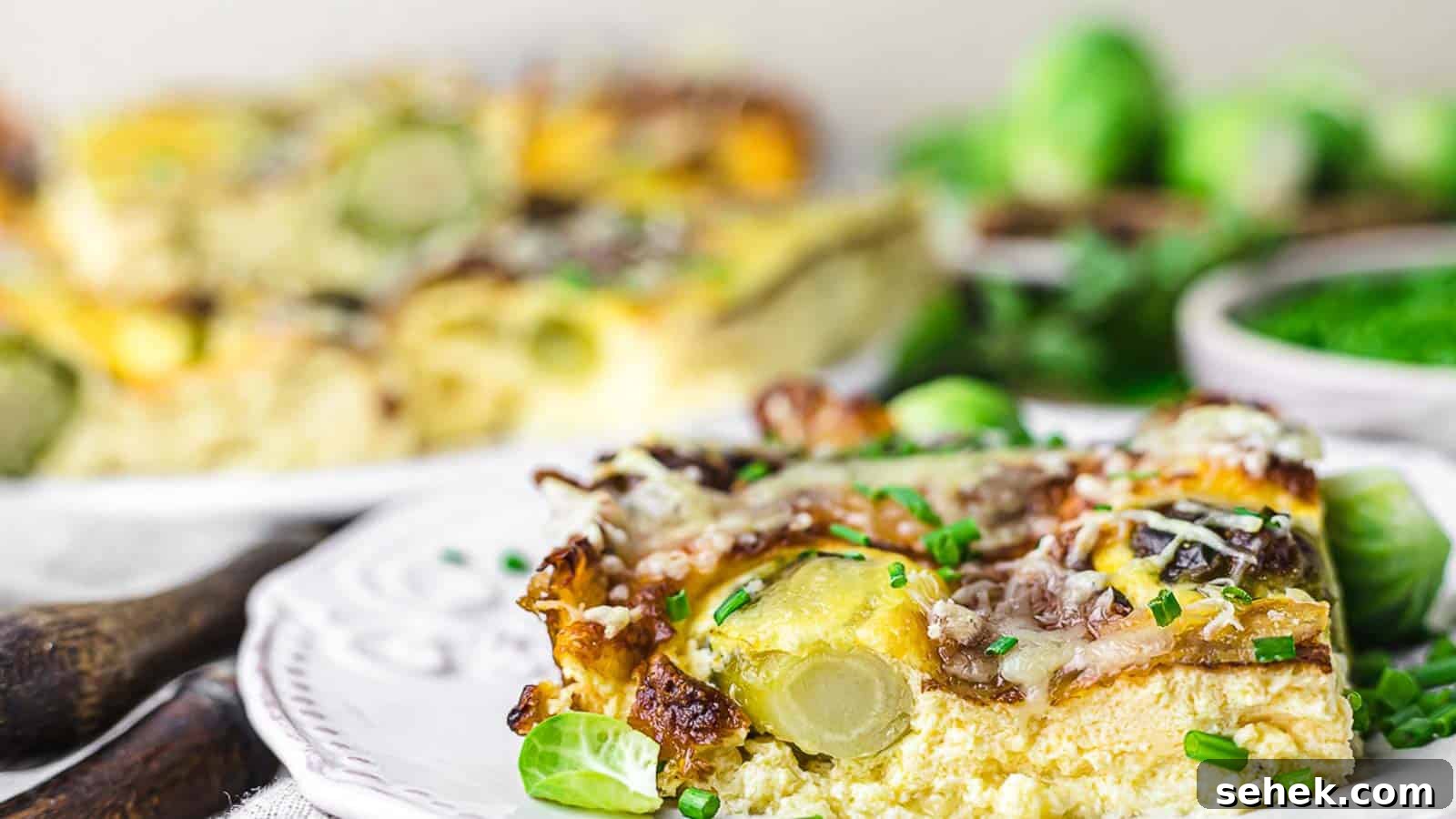 17 Cozy Casseroles for Any Night of the Week 9 Brussel Sprouts Casserole piece on a white plate.