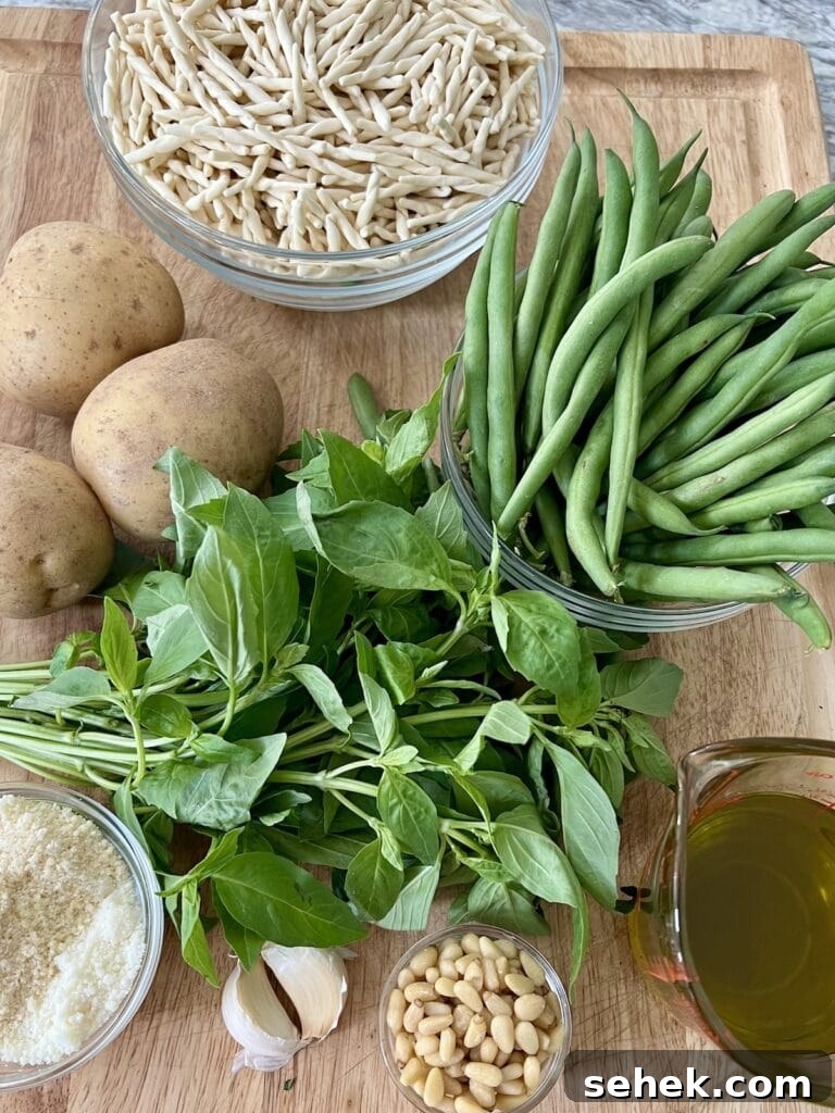 Trofie al Pesto Genovese with Potatoes and Green Beans 4 All ingredients for trofie al pesto genovese on cutting board.