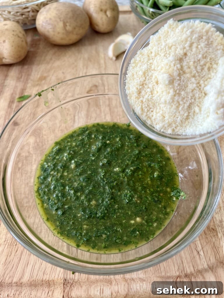 Trofie al Pesto Genovese with Potatoes and Green Beans 8 Adding grated cheese to basil mixture to finish pesto.