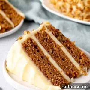 Layered Carrot Cake with Cream Cheese Frosting 9 Slice of carrot cake layer cake with cream cheese icing