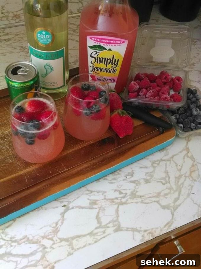 40+ Refreshing Summer Cocktail Recipes for Parties and Picnics 20 Moscato Wine Punch - Over 40 of the BEST Summer Cocktails