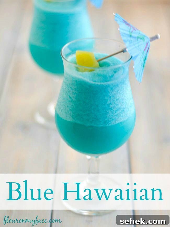 40+ Refreshing Summer Cocktail Recipes for Parties and Picnics 7 Blue Hawaiian Cocktail - Over 40 oft he BEST Cocktails!