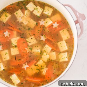 20+ Simple Vegan Soup Recipes for Every Season 15 an overhead shot of a pot of vegan chicken noodle soup