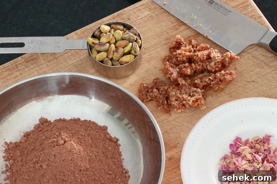 How to Make Rich Homemade Dark Chocolate at Home 3 Cocoa powder, pistachios, minced dates, and rose petals