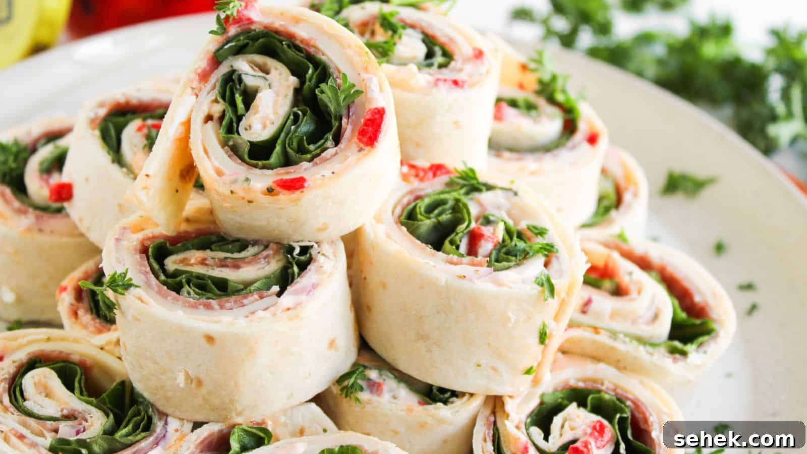 9 Pinwheel Recipes Guests Always Request Again 10 A plate of tortilla pinwheel sandwiches filled with spinach, cream cheese, red peppers, and herbs, neatly stacked and garnished with parsley.