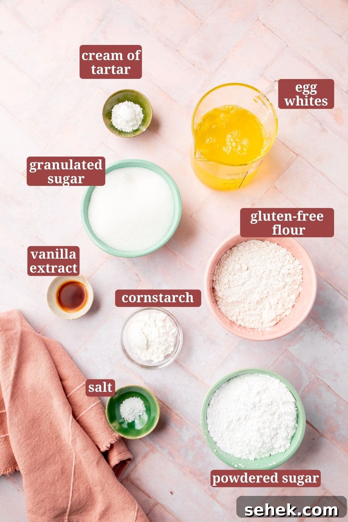 Light and Fluffy Gluten-Free Angel Food Cake Recipe 3 Infographic on ingredients in prep bowls for a gluten-free angel food cake.