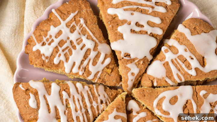 gluten-free pumpkin scones on a pink serving plate.