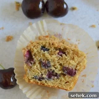 Cherry Crumble Muffins Recipe — Classic Cherry Streusel Muffins 11 Cross section of a muffin
