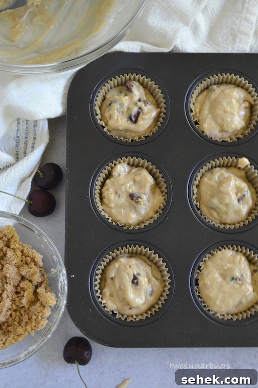 Cherry Crumble Muffins Recipe — Classic Cherry Streusel Muffins 7 Overhead shot of muffin batter in muffin tin