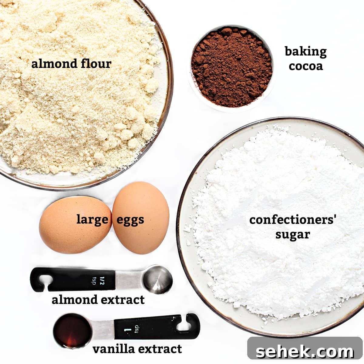 Ingredients: almond flour, baking cocoa, large eggs, confectioners' sugar, almond extract, vanilla extract.