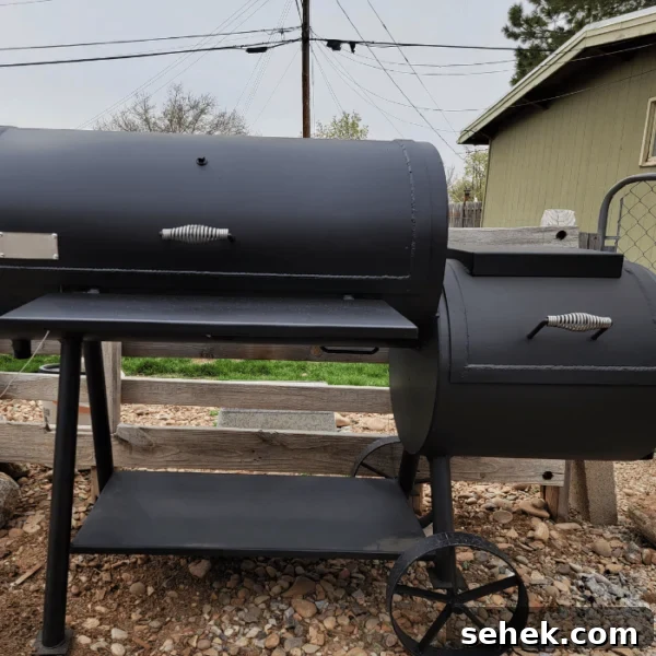 Masterbuilt Gravity Series Grill Review: Performance, Features & Verdict 10 A smoker in a backyard.
