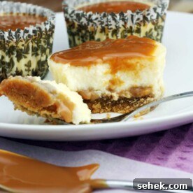 3 caramel cupcake cheesecakes on a white plate with a fork.