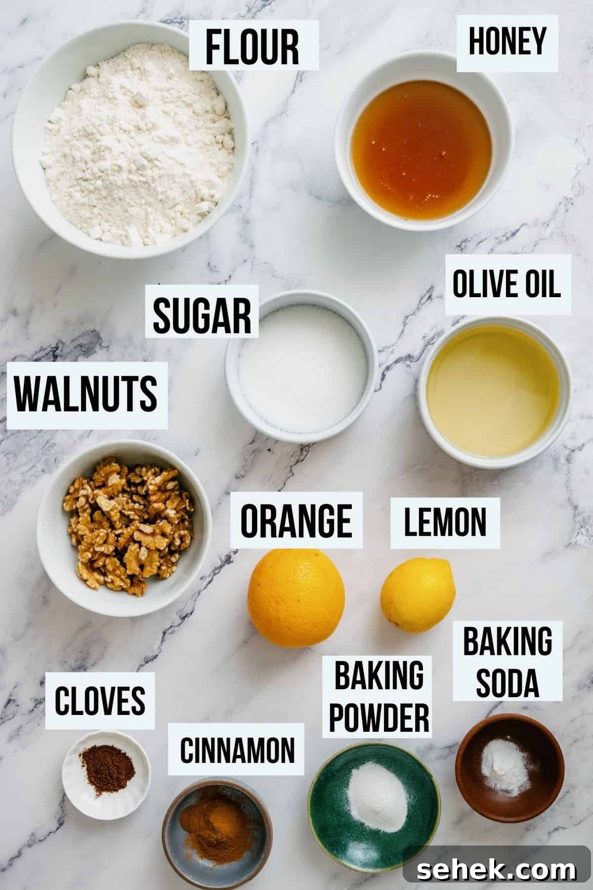 Melomakarona Greek Christmas Honey Cookies Recipe 3 a marble table with ingredients required to make melomakarona.