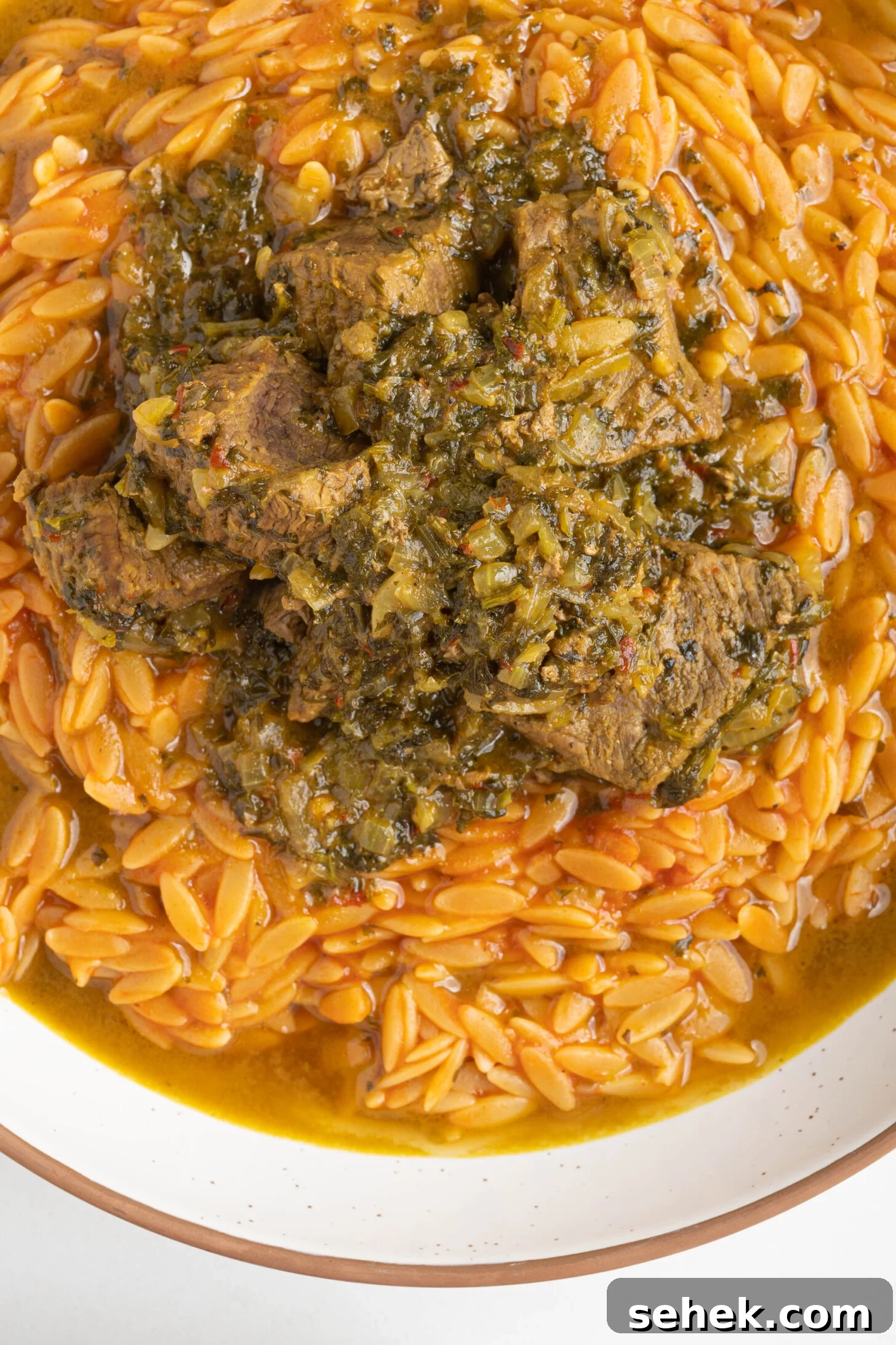 Moroccan Lamb and Orzo Recipe with Warm Spices 2 a bowl of orzo with lamb